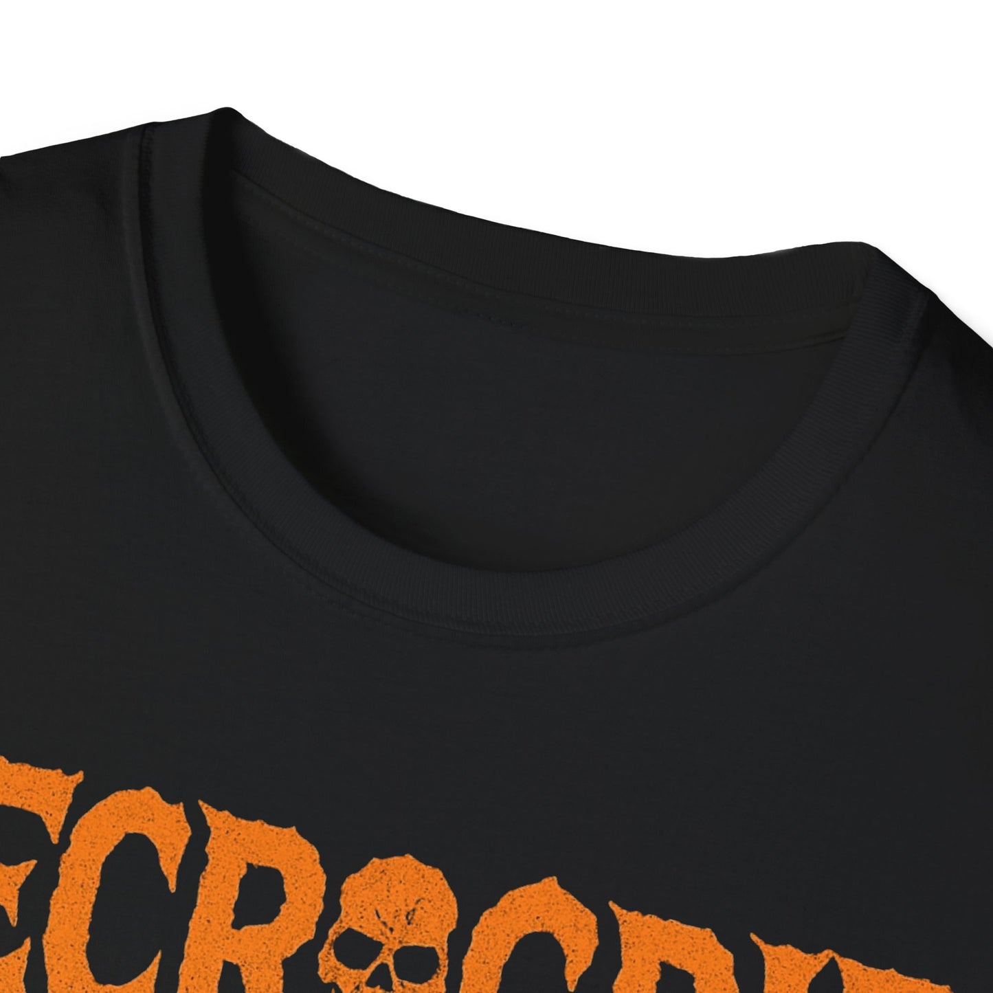 Close-up of Necro-o-lantern Halloween pumpkin graphic on black Gildan Softstyle cotton t-shirt, showcasing print detail and texture