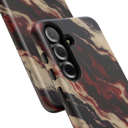 NecroGrip “Fascia” impact-resistant phone case with red, bone, and black marbled streaks, abstract muscle-like pattern on a slim dual-layer shell.