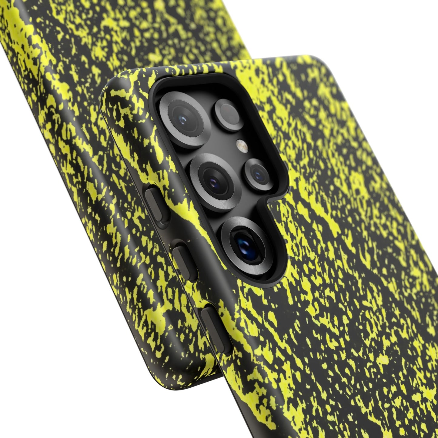 Close-up of a smartphone case with a black and neon yellow splatter pattern, shown on a phone against a white background.