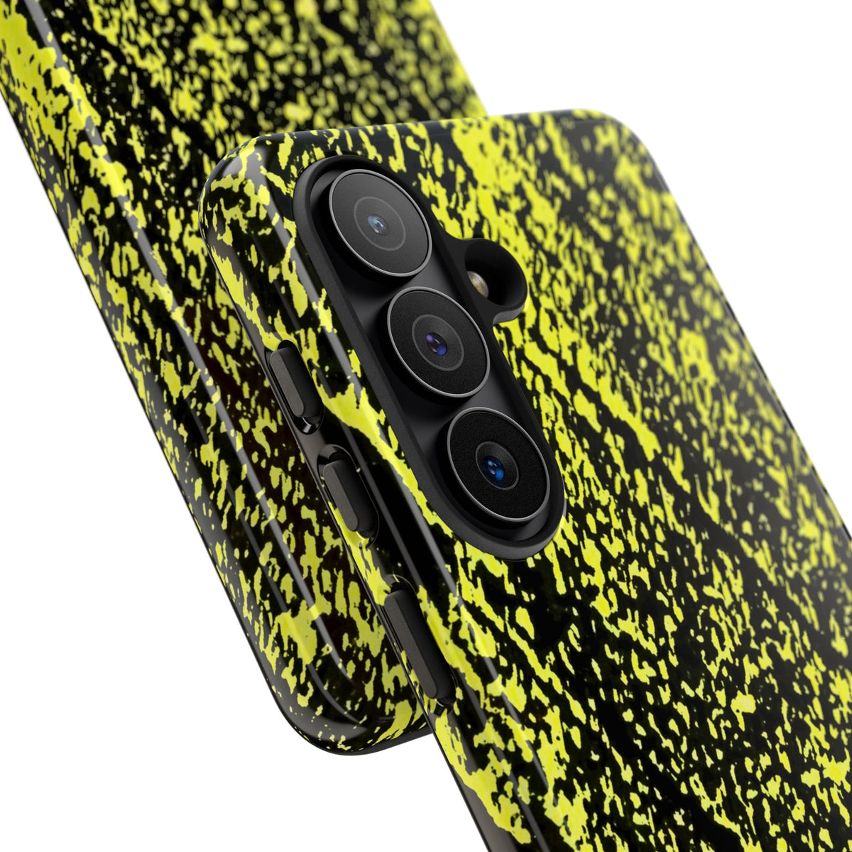 A close-up of a smartphone case with a black and neon yellow splatter pattern, showing the camera cutout and side buttons on a white background.