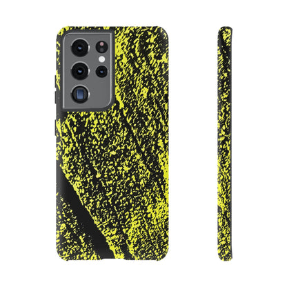 A phone case with a black and neon yellow splattered paint pattern, shown from both the back and side views on a white background.