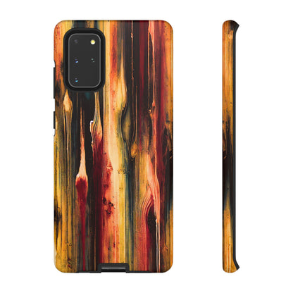 Rupture by NecroGrip tough phone case with red, gold, and black drip design