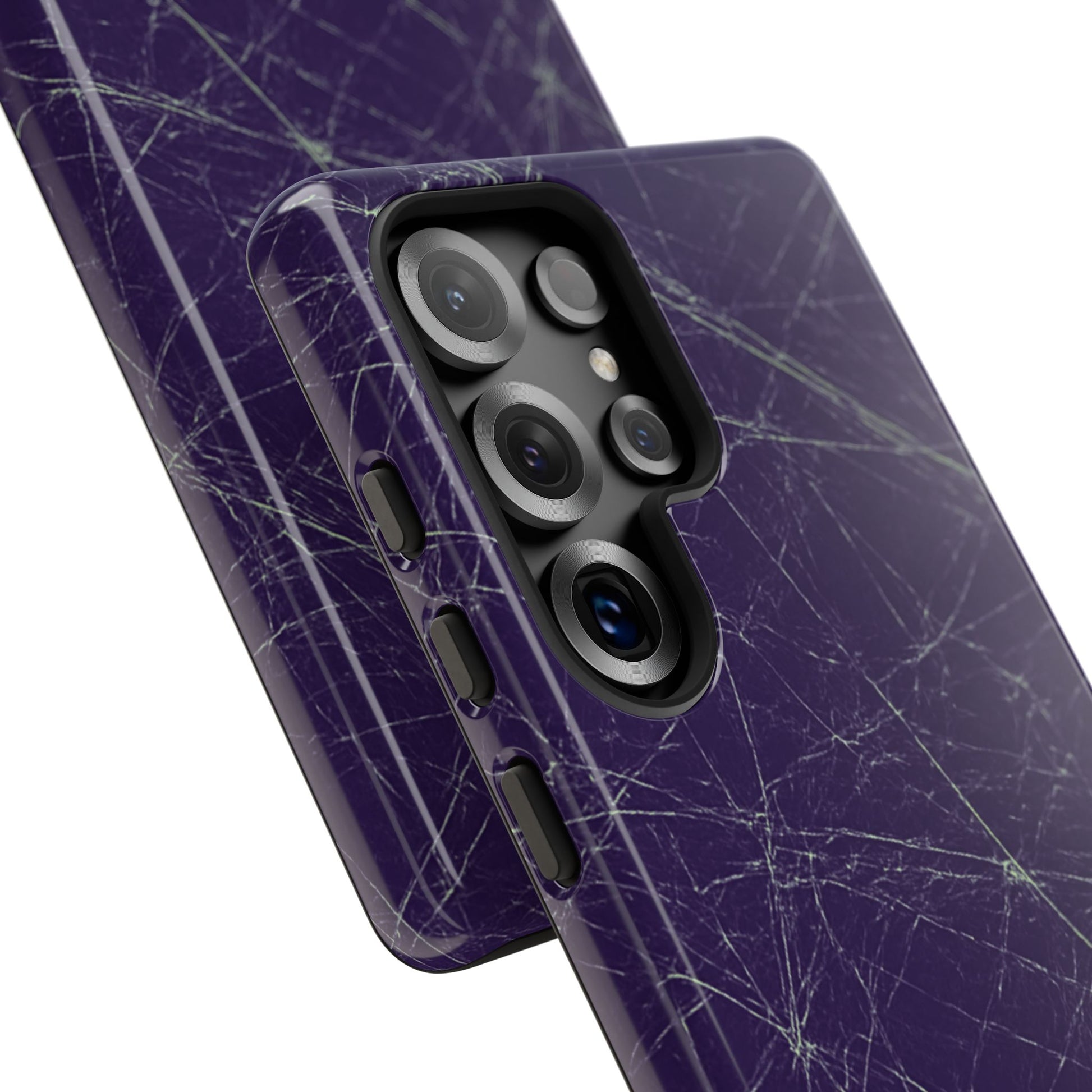 Fragmented impact-resistant phone case with cracked-glass design by NecroGrip.