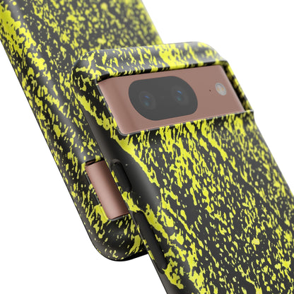 Close up of Bloom to Consume protective phone case featuring a black and toxic yellow organic decay pattern.