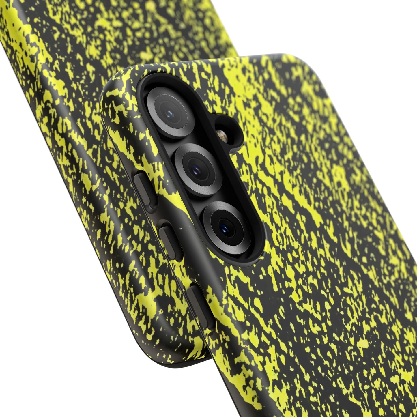 Close-up of a smartphone case with a black and neon yellow splatter pattern, fitted on a phone with a triple-camera system, shown against a plain white background.