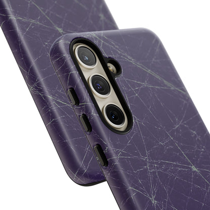 Fragmented impact-resistant phone case with cracked-glass design by NecroGrip.