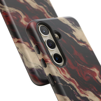 NecroGrip “Fascia” impact-resistant phone case with red, bone, and black marbled streaks, abstract muscle-like pattern on a slim dual-layer shell.