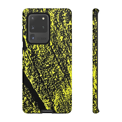 Bloom to Consume protective phone case featuring a black and toxic yellow organic decay pattern.