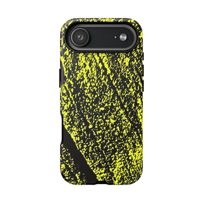 A phone case featuring a high-contrast black and neon yellow splatter pattern, shown on a solid white background.