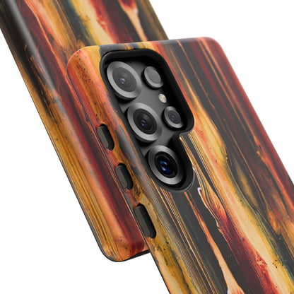 Rupture by NecroGrip tough phone case with red, gold, and black drip design