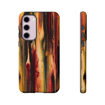 Rupture by NecroGrip tough phone case with red, gold, and black drip design