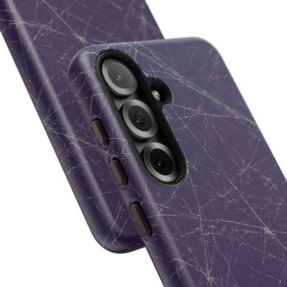 Fragmented impact-resistant phone case with cracked-glass design by NecroGrip.