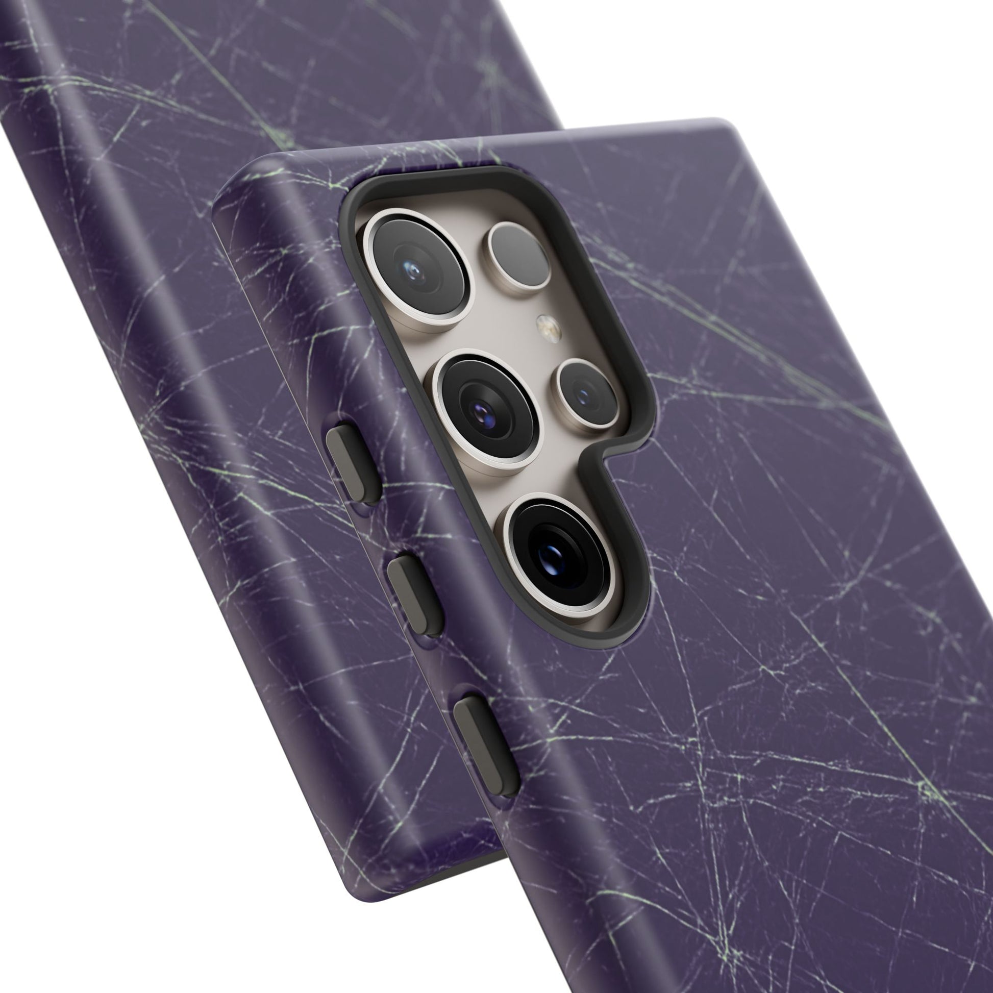 Fragmented impact-resistant phone case with cracked-glass design by NecroGrip.