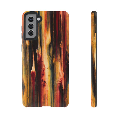 Rupture by NecroGrip tough phone case with red, gold, and black drip design