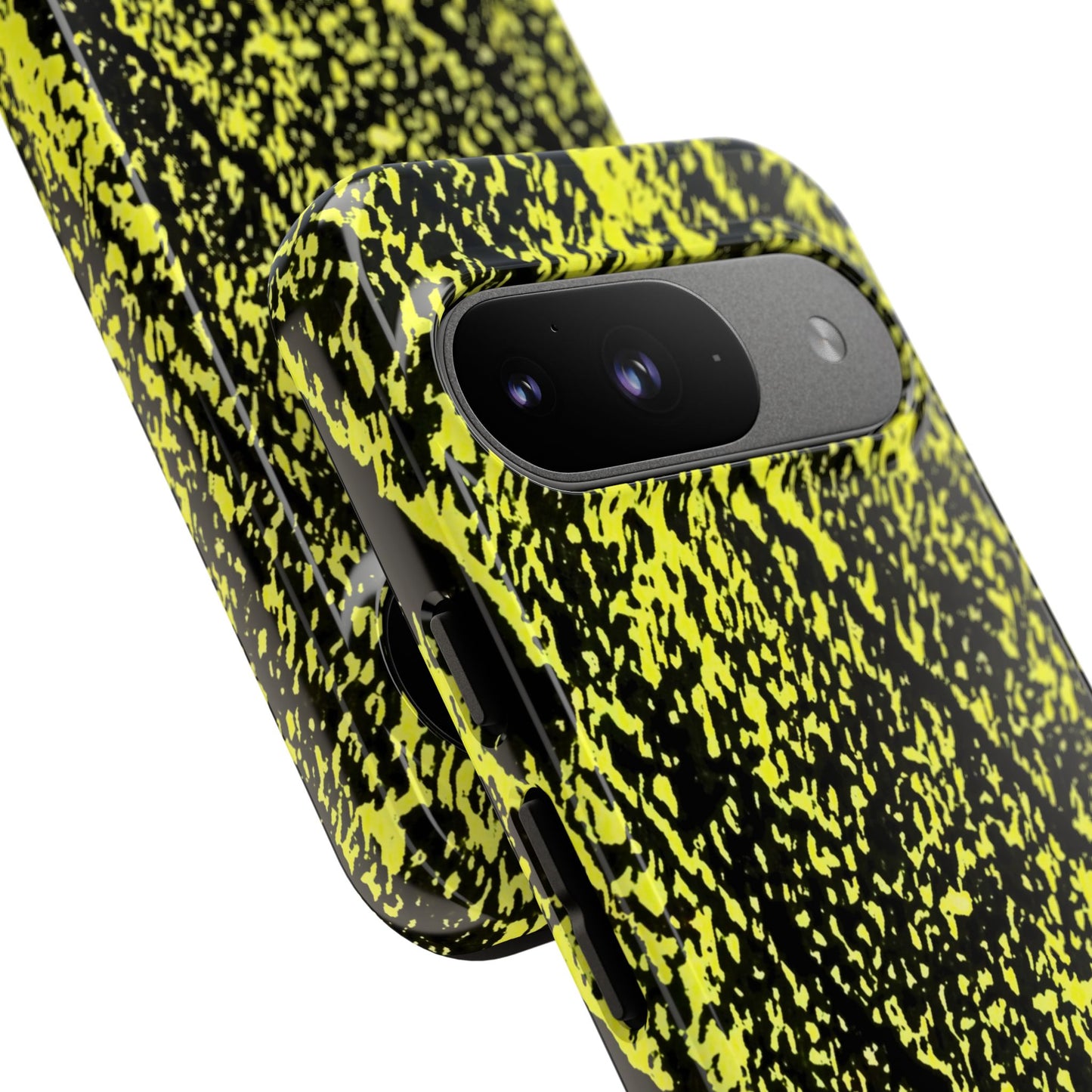 Close-up of a smartphone case with a high-contrast black and neon yellow splatter pattern, shown on a white background.