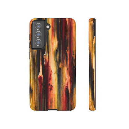 Rupture by NecroGrip tough phone case with red, gold, and black drip design