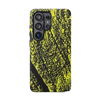 A protective phone case featuring a high-contrast black and neon yellow splatter pattern, shown on a plain white background.