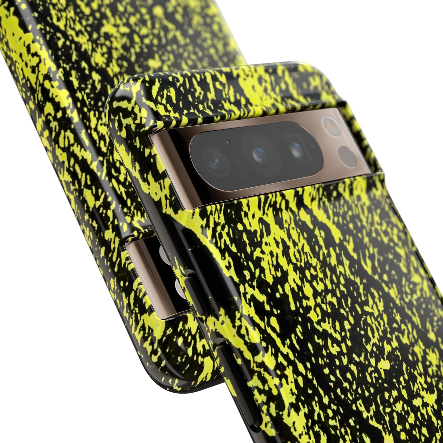 Close-up of a smartphone case with a high-contrast black and neon yellow splatter pattern, fitted on a phone, shown against a plain white background.