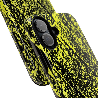A close-up of a phone case with a black and neon yellow splatter pattern, showing the camera cutout and side buttons on a white background.
