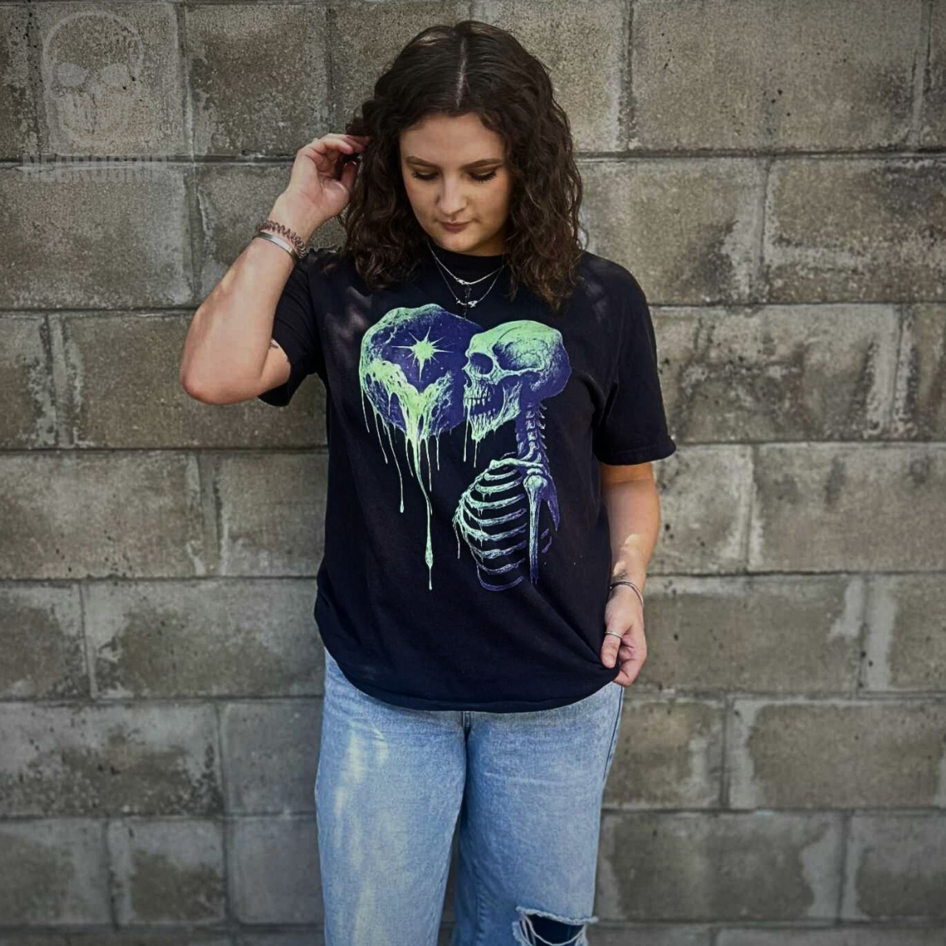 Customer in NecroGrip tee with a dripping skeleton printed on black Comfort Colors.
