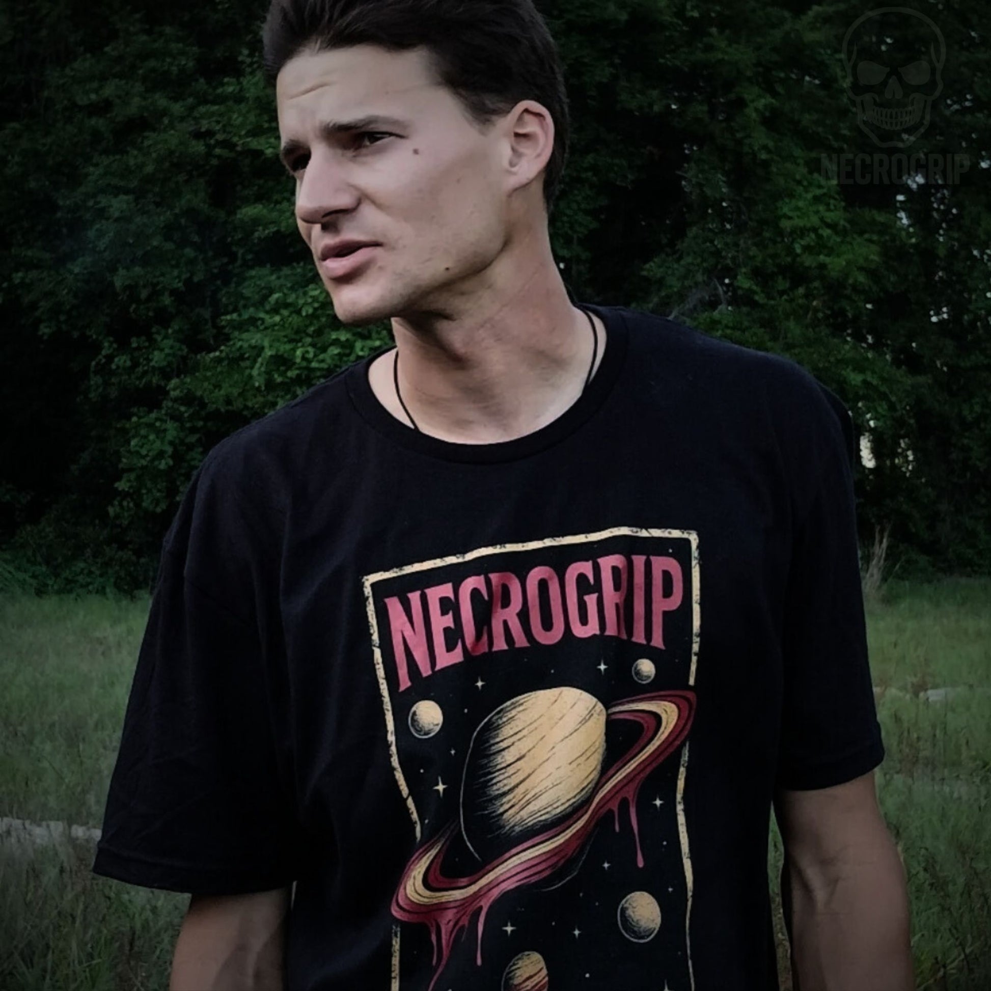 Julius Conney wearing NecroGrip Blood Rings t-shirt printed on black Gildan Softstyle.
